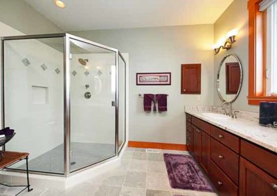 Big beautiful bathroom with a big shower and a double sink